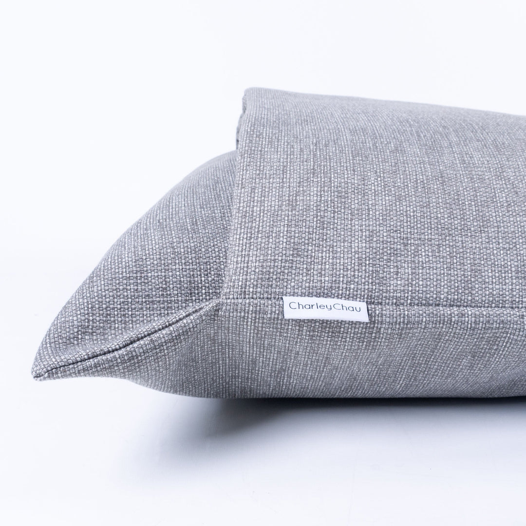 Close up of the Dog Snuggle Bed for Scrabblers in Weave II (Heron Grey colour) - a luxury cosy cave style dog bed made with a resilient upholstery quality fabric.