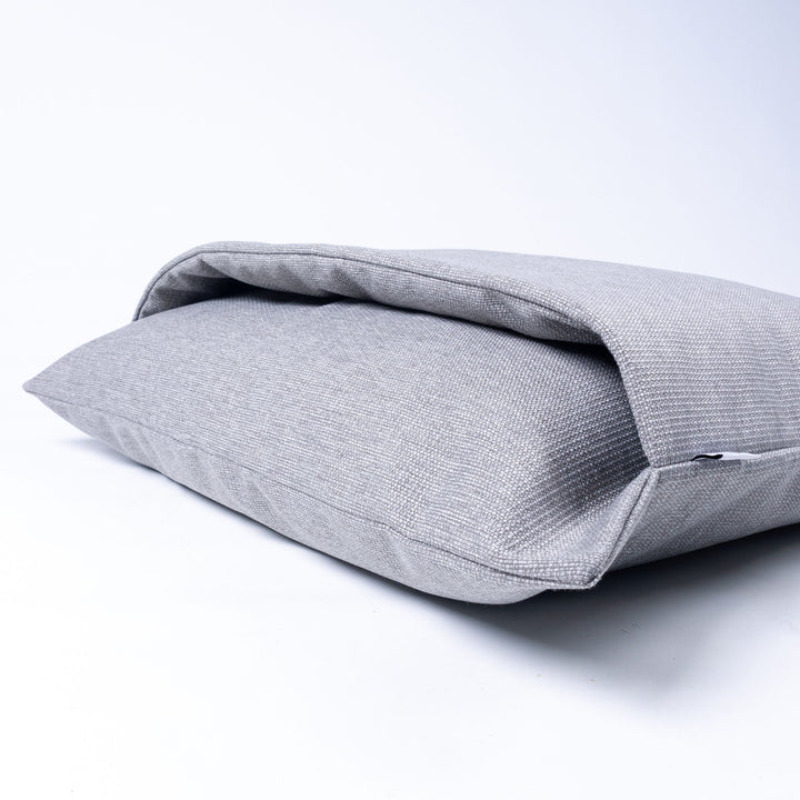 A burrow dog bed by Charley Chau - the Dog Snuggle Bed for Scrabblers in Weave II (shown in Heron Grey colour)