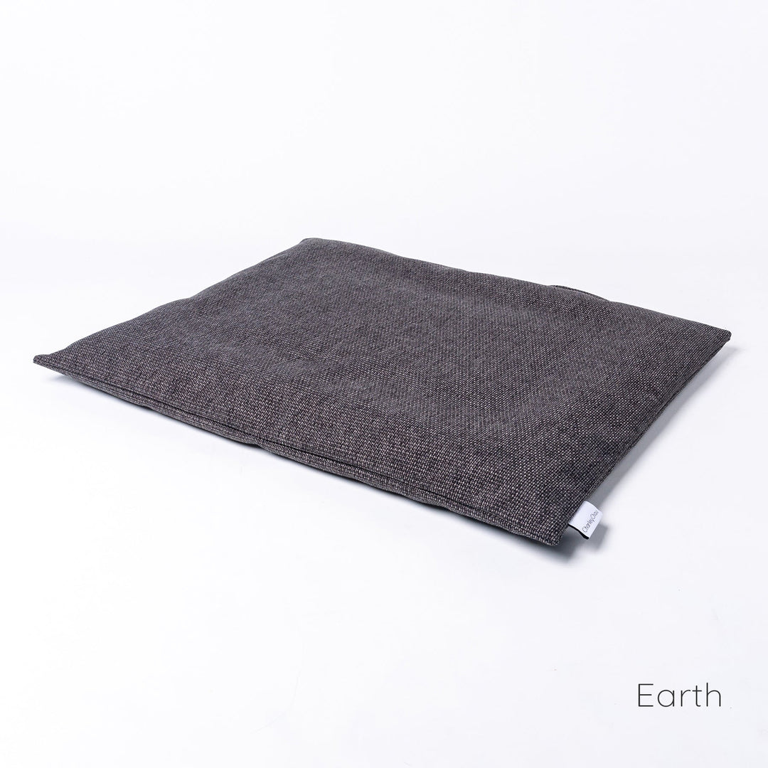 Luxury Dog Travel Pad by designer Charley Chau in Weave II, a textured upholstery fabric in dark neutral Earth tone. 