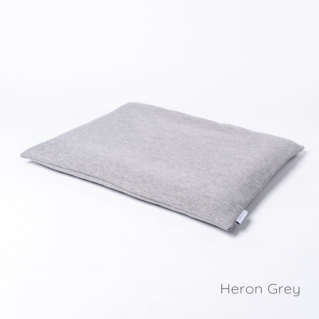 Luxury Dog Travel Pad by designer Charley Chau in Weave II, a textured upholstery fabric in a cool neutral grey, Heron Grey. 