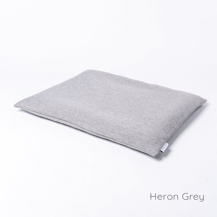 Luxury Dog Travel Pad by designer Charley Chau in Weave II, a textured upholstery fabric in a cool neutral grey, Heron Grey. 