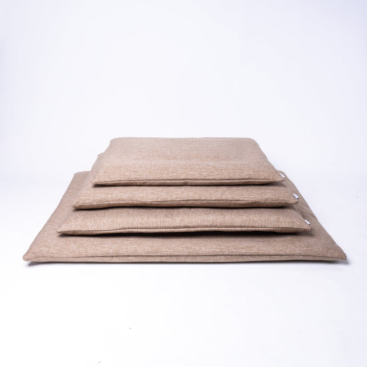 Luxury Dog Travel Pad by designer Charley Chau in four sizes - a slimline dog travel mat which is easily portable .