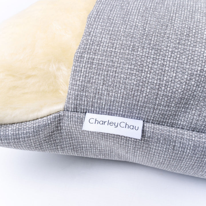 Detail of Charley Chau brand label on Dog Snuggle Bed, burrow bed style luxury dog bed in Heron Grey